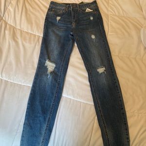 A dark blue high rise skinny jeans from Wild Fable. A size 4. Never worn.